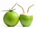 Two green coconuts, one whole and one prepared with gold straws on white background drink Royalty Free Stock Photo
