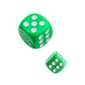 Two green dice in air on white background Royalty Free Stock Photo