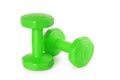 Two of green dumbbells Isolated on white background.