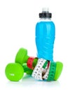 Two green dumbells, tape measure and drink bottle. Fitness and h Royalty Free Stock Photo