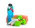 Two green dumbells, tape measure and drink bottle. Fitness and h Royalty Free Stock Photo