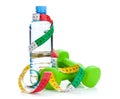 Two green dumbells, tape measure and water bottle Royalty Free Stock Photo