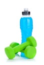 Two green dumbells and water bottle Royalty Free Stock Photo