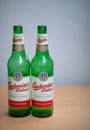 Two green empty Budweiser beer bottles. Royalty Free Stock Photo