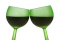 Two green glasses with red wine