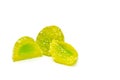 Two green jelly candies halved