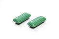 Two green mints isolated on white background. Sweet Chewing gums close-up Royalty Free Stock Photo
