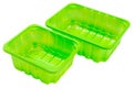 Two green plastic food containers, different sizes, stand side by side, on a white background Royalty Free Stock Photo