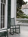 Two green rocking chairs