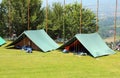 Two green scout tents already mounted Royalty Free Stock Photo