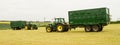 Two green tractor's and Bailey trailer's Royalty Free Stock Photo
