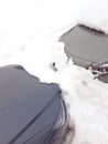 Two grey cars buried under snow Royalty Free Stock Photo