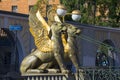 The two griffins on the Bank bridge with an odd side of the canal. Saint Petersburg Royalty Free Stock Photo