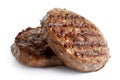 Two grilled hamburger patties on white. Royalty Free Stock Photo