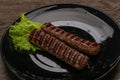Two Grilled kebeb beef sausages Royalty Free Stock Photo