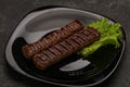 Two Grilled kebeb beef sausages Royalty Free Stock Photo