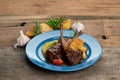 Two grilled lamb chops and potatoes served on pea puree with a mint sauce Royalty Free Stock Photo