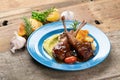 Two grilled lamb chops and potatoes served on pea puree with a mint sauce Royalty Free Stock Photo