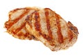 Two grilled pork chops on white background Royalty Free Stock Photo