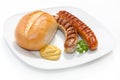 Two Grilled Sausage with mustard, bread Royalty Free Stock Photo