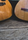 two guitars on wood with nature background, vintage Royalty Free Stock Photo