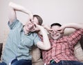 Two guys with funny gestures Royalty Free Stock Photo