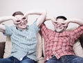 Two guys with funny gestures Royalty Free Stock Photo