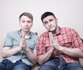 Two guys with funny gestures Royalty Free Stock Photo