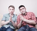 Two guys with funny gestures Royalty Free Stock Photo