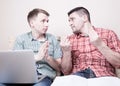 Two guys with funny gestures Royalty Free Stock Photo