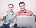 Two guys with gadgets Royalty Free Stock Photo