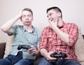 Two guys playing video games Royalty Free Stock Photo