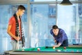 Two guys in pool billiard club playing pool billiard Royalty Free Stock Photo
