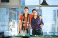 Two guys in pool billiard club playing pool billiard Royalty Free Stock Photo