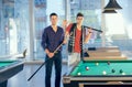 Two guys in pool billiard club playing pool billiard Royalty Free Stock Photo