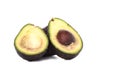 Two Haas Avocado Fruits Isolated Over White Background. Royalty Free Stock Photo