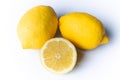 Two and a half lemons isolated on a white background Royalty Free Stock Photo