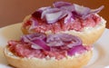Two half-mead rolls with red onions, closeup Royalty Free Stock Photo