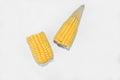 Two half pieces of sweet yellow ear of corn isolated in a white background Royalty Free Stock Photo
