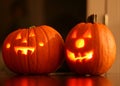 Two Halloween Jack-O-Lanterns Glowing From Within Royalty Free Stock Photo