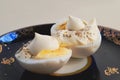 Two halves of boiled egg with sauce and pepper Royalty Free Stock Photo