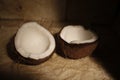 Two halves of coconut with white pulp Royalty Free Stock Photo