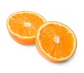 Two halves of fresh juicy orange on a white isolated background. Close-up. Royalty Free Stock Photo