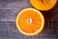 Two halves of an orange top view. Preparation of freshly squeezed juice. Royalty Free Stock Photo