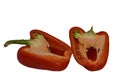 Two halves of pepper paprika look in front of the isolate Royalty Free Stock Photo