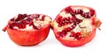 Two halves of pomegranate on white background Royalty Free Stock Photo