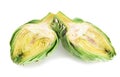 Two halves of ripe green artichokes on a white background Royalty Free Stock Photo