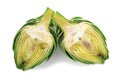 Two halves of ripe green artichokes on a white background Royalty Free Stock Photo