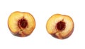 two halves of a ripe peach with a pit isolated on a white background Royalty Free Stock Photo