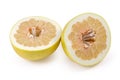 Halved ripe pomelo fruit on a white background Royalty Free Stock Photo